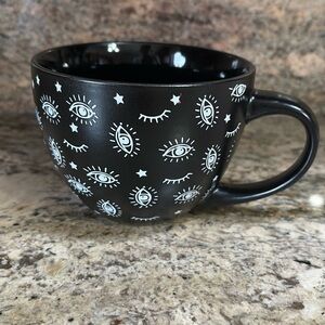 Evil eye stars black white coffee tea mug 18 oz
MADE IN USA